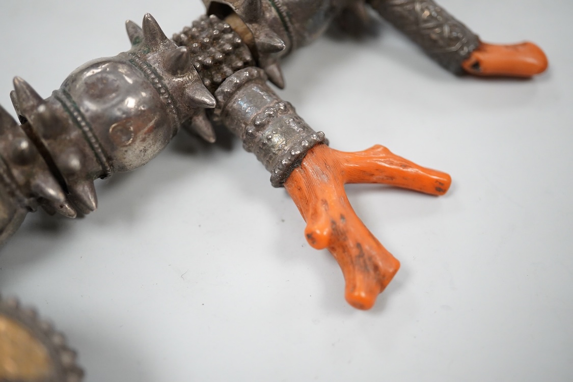 A Bedouin white metal and coral mounted necklace, from Oman, 58cm long
